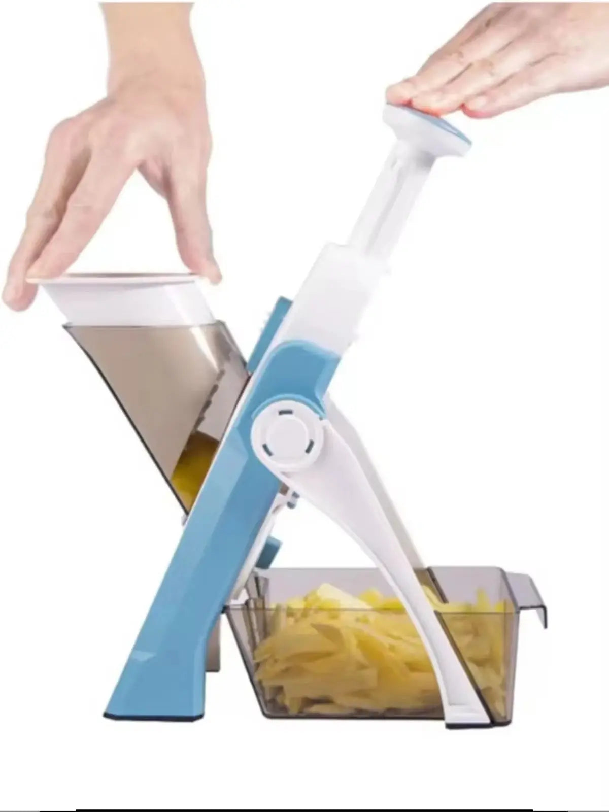 Manual vegetable cutter with adjustable mandoline slicer, featuring a blue and white design, slicing potatoes into a transparent container.