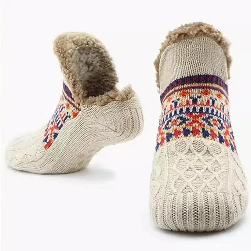 Beige fuzzy slipper socks with grips and colorful pattern