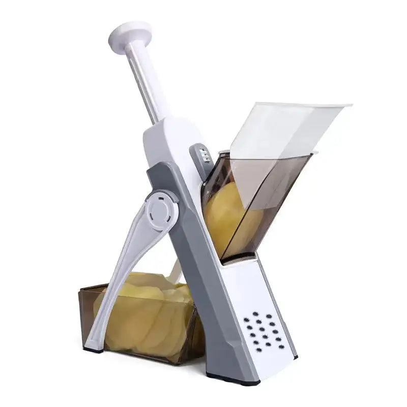 Manual vegetable cutter with adjustable slicing mechanism, featuring a safe mandoline design and a container for effortless food prep.