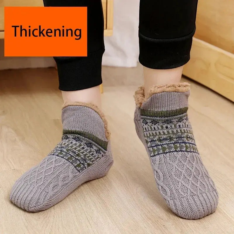 Gray thick fuzzy slipper socks worn for warmth