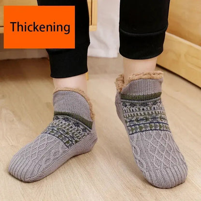 Gray thick fuzzy slipper socks worn for warmth