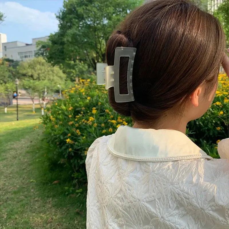 Woman outdoors with clear jelly matte hairpin