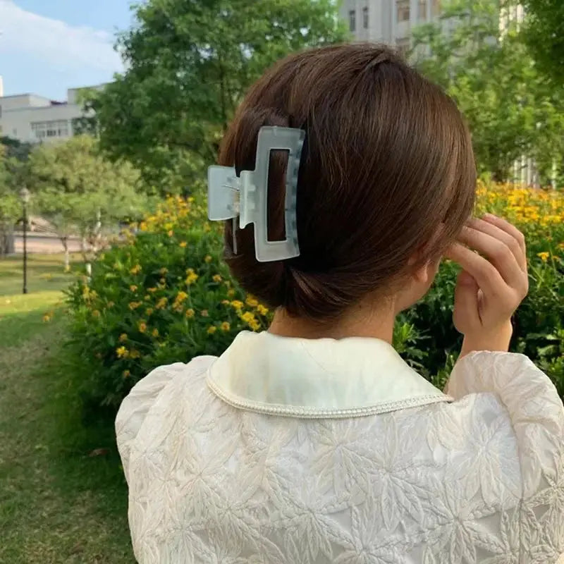 Woman outdoors with clear jelly matte hairpin